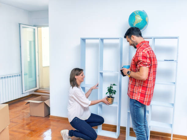 istock Couple moving into their new home 958948758