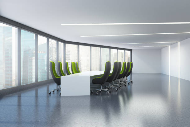istock Panoramic meeting room, green armchairs 958949156