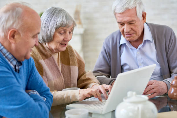 istock Elderly people using laptop in nursing home 958949254