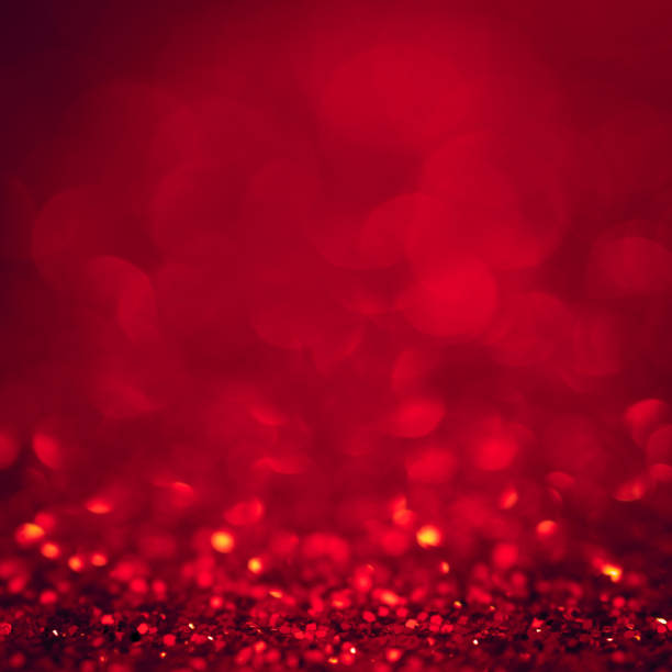 istock background red christmas light glitter abstract xmas with bokeh background celebration bright dark black party elegant backdrop and sparkle for love valentine day wedding or happy holiday new year. 958950328