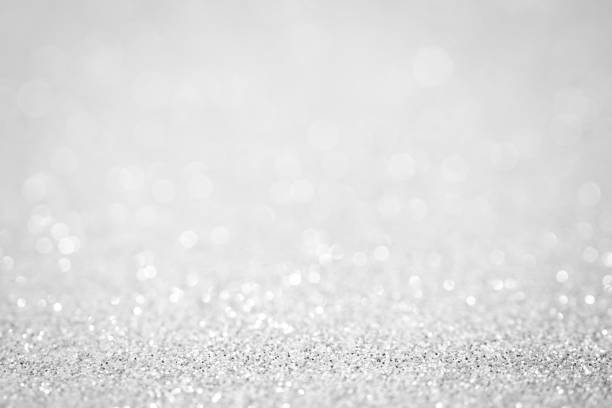 istock Lights on white silver background abstract beautiful blink light with bokeh bright winter and christmas decoration design blur backdrop luxury 958952678