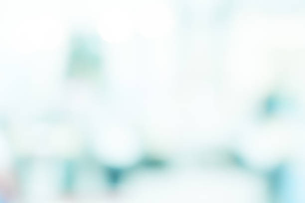 istock White blur abstract background art design backdrop bokeh bright color decoration gray from building hallway corridor blank with office copy space 958952740