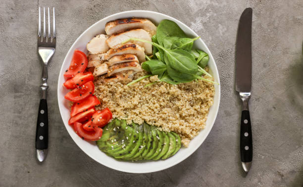 istock Healthy salad bowl with quinoa and chicken 958952792