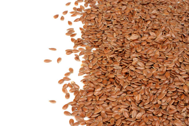 istock flax seeds isolated on white background. flaxseed or linseed. Cereals. top view 958952916