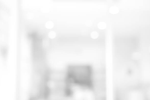 istock light background abstract blur office soft white color from building hallway corridor defocused 958953518