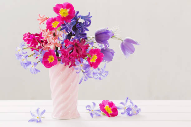 istock beautiful spring flowers in pink vase 958953958