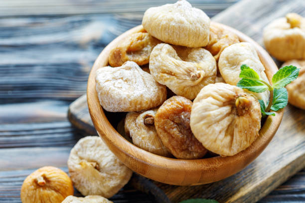 istock Dried figs in a bowl closeup. 958961622