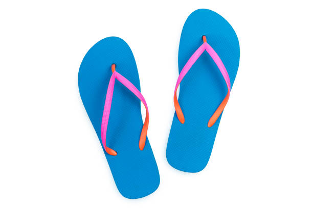 istock Blue flip flops isolated on white background. Top view 958962348