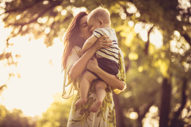 istock Share love and tender. Mother and baby boy. 958968416