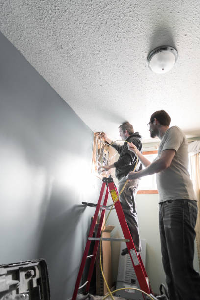 istock Electrician Upgrading a Homes Distribution Board 958968592