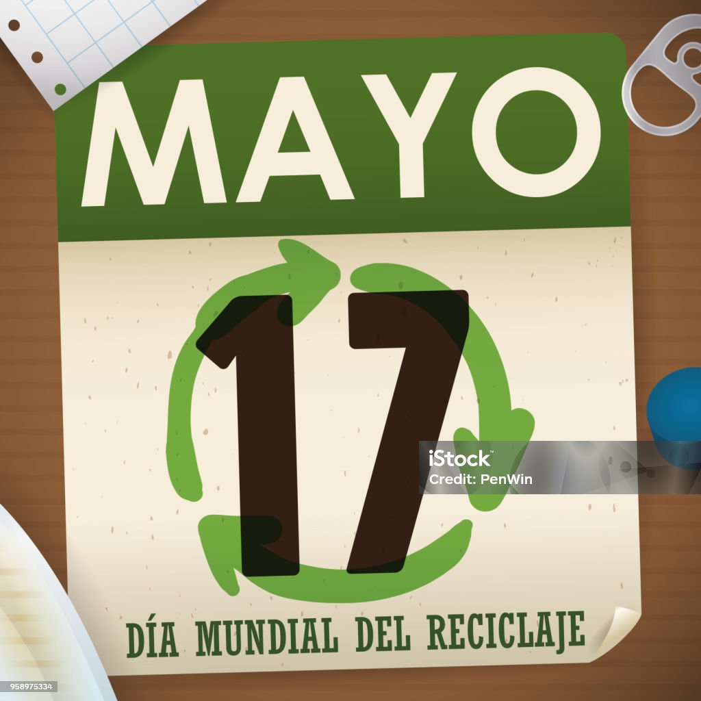 Looseleaf Calendar With Recyclable Materials Around It For Recycling