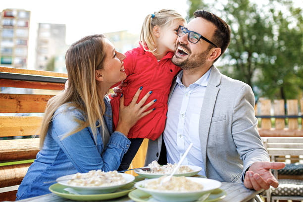 istock Family Enjoying Restaurant 958975558
