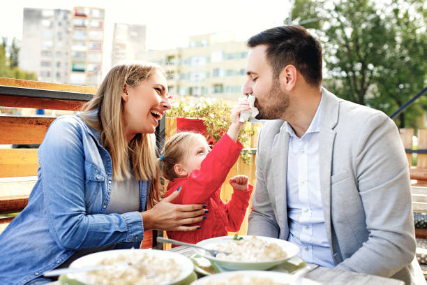 istock Family Enjoying Restaurant 958976282