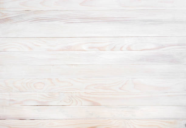 istock White wooden background. Top view. Copy space. 958976926
