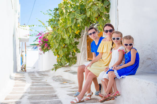 istock Family having fun outdoors on Mykonos streets 958978006