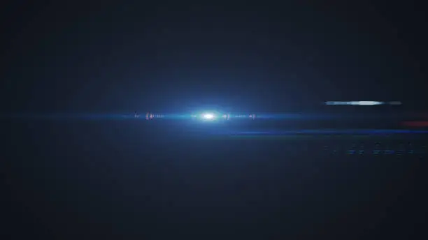 Photo of Abstract of lighting digital lens flare in dark background