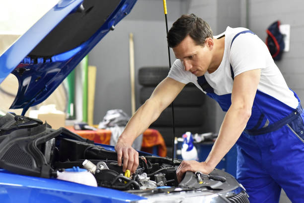 istock car mechanic in a workshop repairing a vehicle 958980914