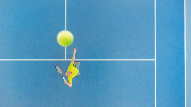 istock Tennis player from above at service 958984516