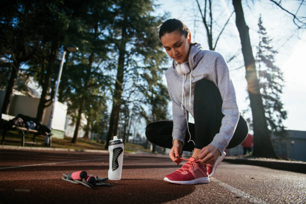 istock Fintess woman preparing for run 958984746