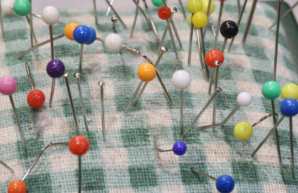 Close-up of a jumble of pins.