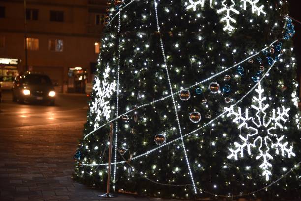 istock Christmas, Christmas tree with snowflake lights and decorations 958987438
