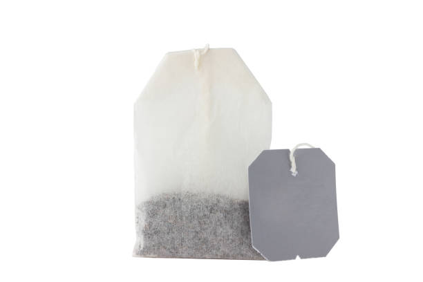 istock A tea bag on a white background. A bag with tea close-up isolated on white background. 958990056