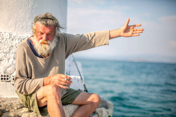 Old fisherman  by the sea