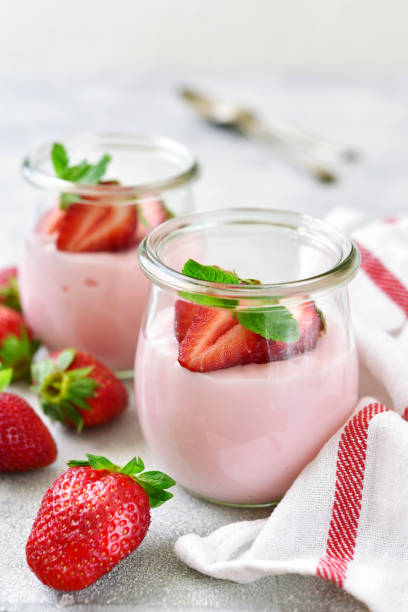 istock Natural strawberry yogurt with fresh berry 958999824