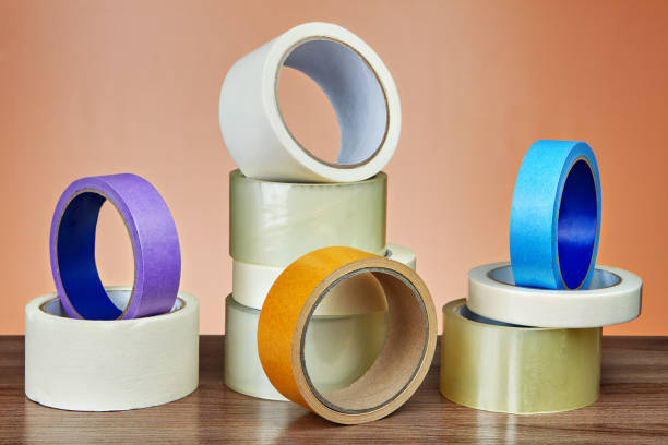 istock Several rolls of adhesive tape for different purposes on table. 959014876