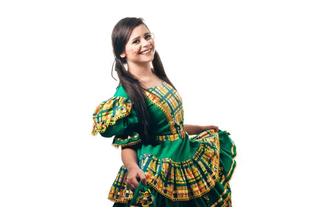 Photo of Brazilian woman wearing typical clothes for the Festa Junina