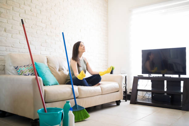 istock Woman taking a break from cleaning home 959020366