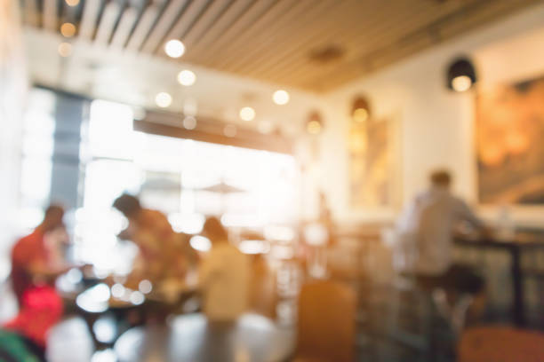 istock Restaurant cafe or coffee shop interior with people abstract defocused blur background 959023560