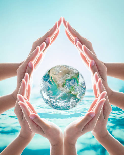 istock World water day, saving bio natural environment concept with hands in drop water cycle. Element of the image furnished by NASA 959023950