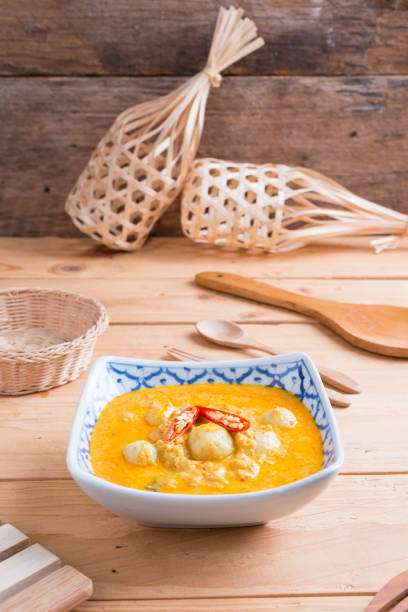istock Coconut milk Curry fish and fish ball with thai rice noodle 959024226