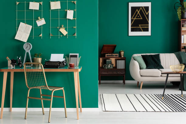 istock Gold chair by the desk 959027050
