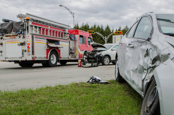 istock Two cars crashed in accident with firetruck behind 959038994
