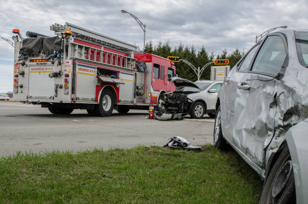 istock Two cars crashed in accident with firetruck behind 959039026