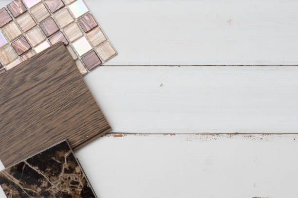 istock samples of material, wood , on concrete table.Interior design select material for idea. 959042786