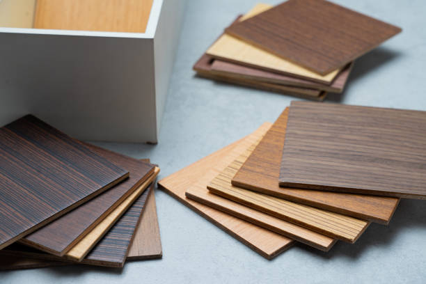 istock samples of material, wood , on concrete table.Interior design select material for idea. 959042898