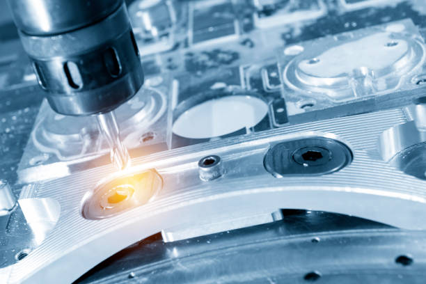 istock The CNC milling machine cutting the aluminium automotive part with the solid ball endmill 959045628