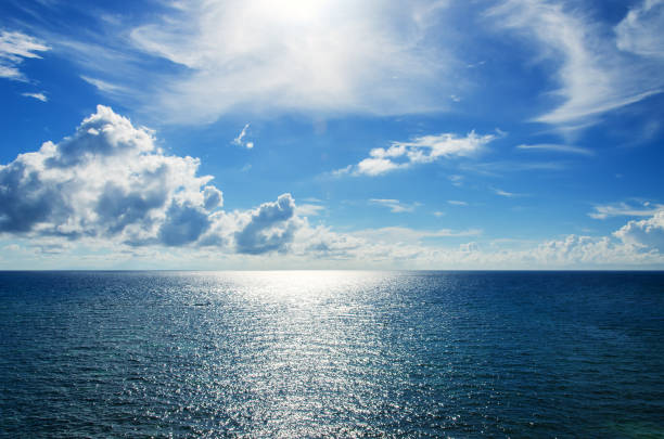 istock Tropical ocean with blue sky and clouds 959046058