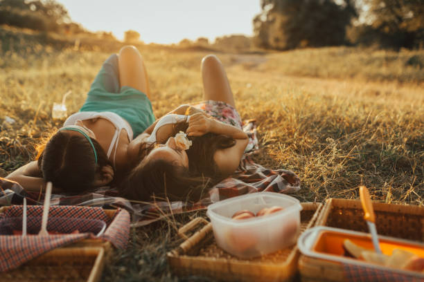 Best friends having a picnic and enjoying a beautiful day
