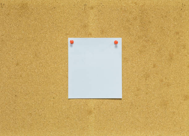 istock Paper on cork board for notice background 959049358