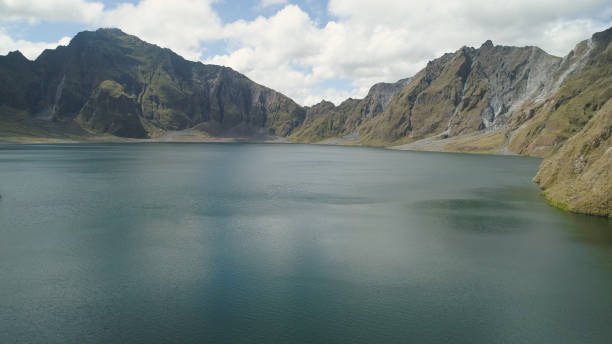 Crater Lake Pinatubo, Philippines, Luzon Crater lake of the volcano Pinatubo among the mountains, Philippines, Luzon. Aerial view beautiful landscape at Pinatubo mountain crater lake. Travel concept zambales province stock pictures, royalty-free photos & images