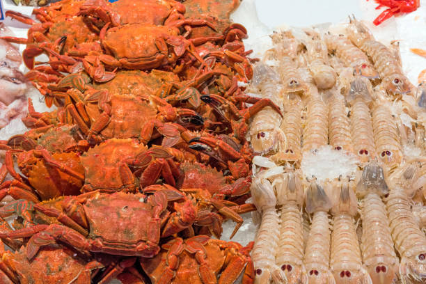 istock Crabs and crayfish for sale at a market 959056120