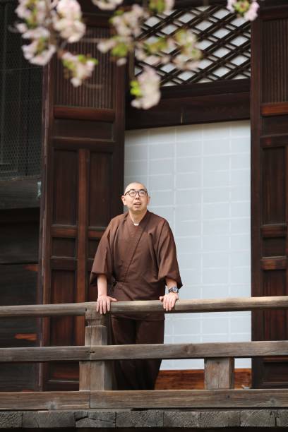 istock Buddhist priest standing at temple in Kyoto 959056736