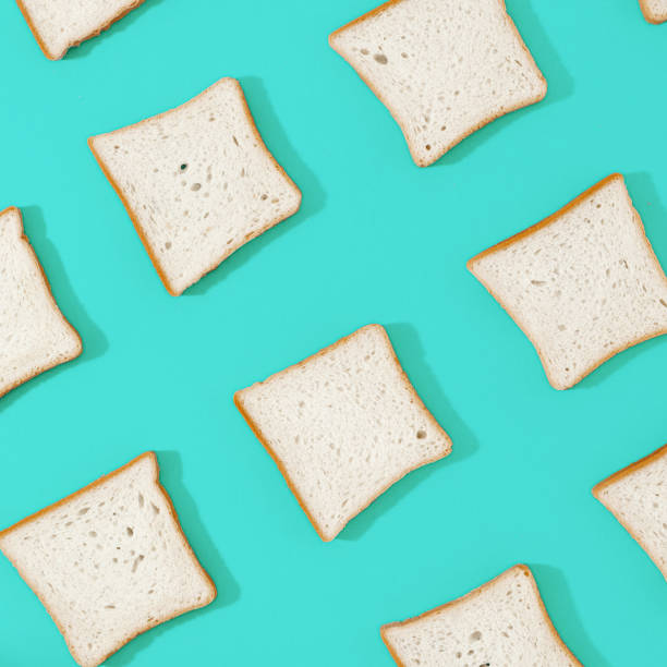 istock Flat lay set toast bread on blue background. Top view minimalist food background 959057502