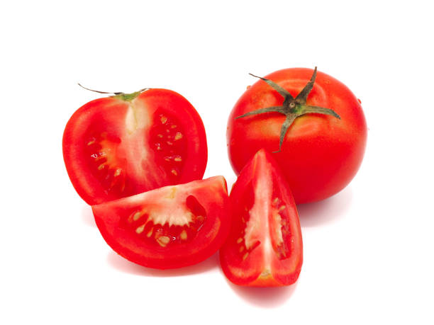 istock Fresh sliced tomato isolated on white background. 959066250