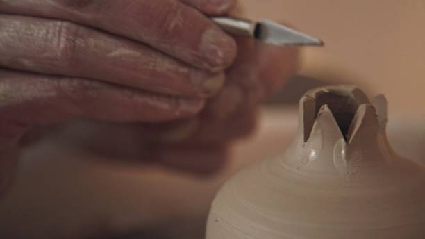 istock Ceramist makes a clay product - a fruit of pomegranate 959069786