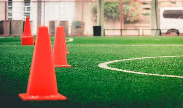 istock Soccer training cone on indoor soccer training ground 959070338